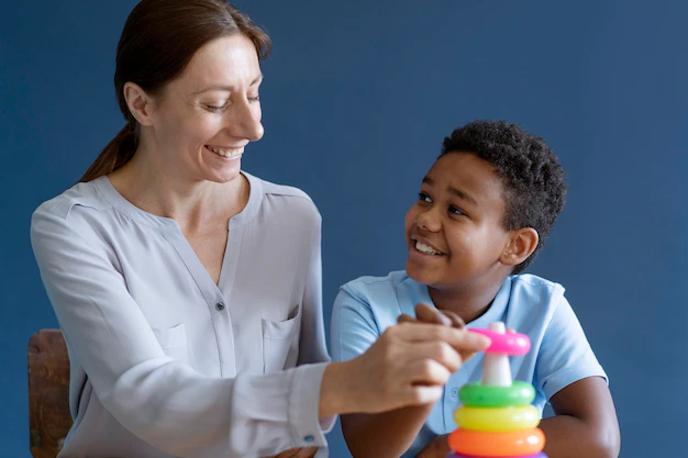 black -kid-doing-occupational-therapy-session_23-2149091537